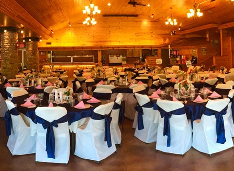 large room is set up and ready for a wedding at River Ranch Resort Noel, Missouri